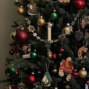 Festive Christmas Tree with Red, Green, and Gold Ornaments